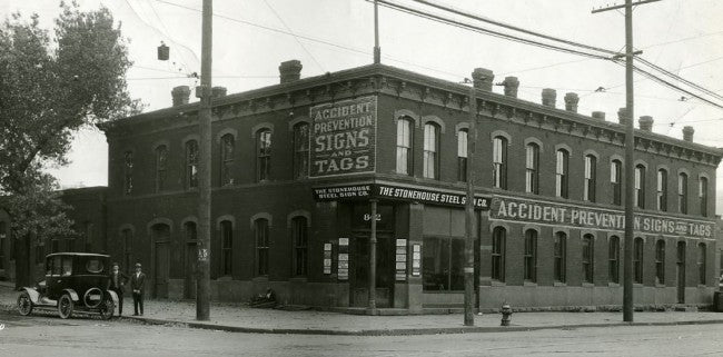 original single-sided c. 1950's american vintage industrial chicago foundry locker room brightly colored "caution" sign with bold lettering