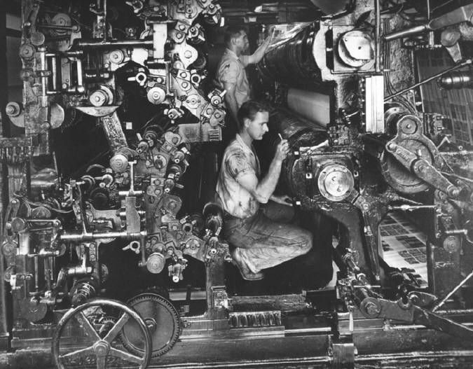 c. 1920's 24-karat gold glazed ornamental terra cotta r.r. donnelley printing plant exterior facade shield with hand trowel