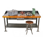 solidly constructed early 1940's american industrial four-legged maple wood pollard workbench with brushed metal finish