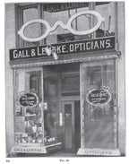 rare original early 20th century oversized reverse-painted easel back "lens duplicated" optician scalloped edge glass sign with hanger