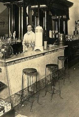 late 19th or early 20th century american antique four-legged ice cream parlor twisted wire stool with varnished oat wood seat