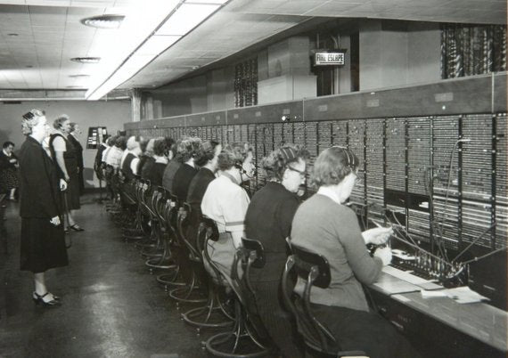 all original highly desirable c. 1930's american vintage industrial western electric switchboard operator adjustable height chair with intact purse holder