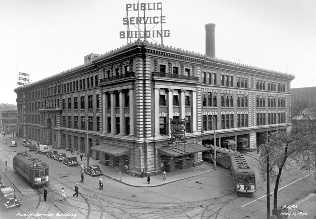 early 20th century custom-designed ornamental cast bronze milwaukee electric railway and light company doorknob and matching backplate