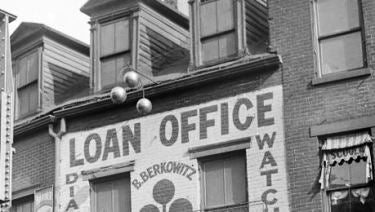 original early 20th century iron and brass exterior american pawn shop trade sign