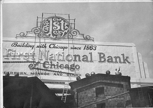 hard to find and all original dug downtown chicago collectible early 1970's cast spelter or "white metal" banthrico coin bank representing the first national bank of chicago, il.