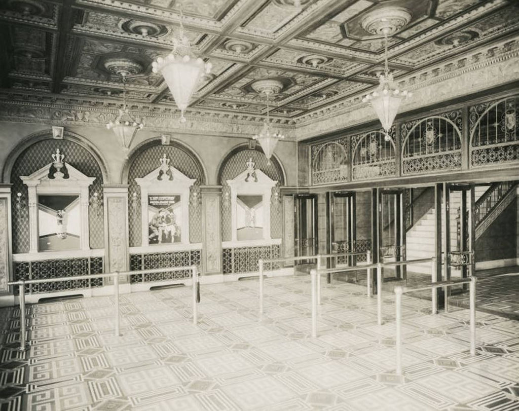 original 1929 spanish revival style ornamental wrought iron capitol theater building entrance door push bar