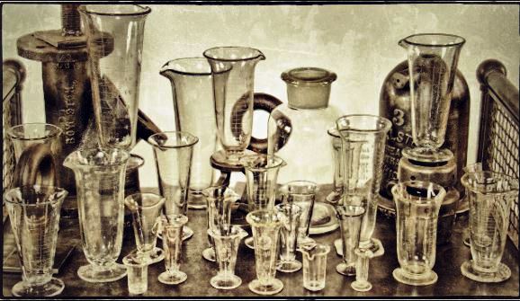 group of original early 20th century american antique medical or apothecary drugstore diminutive pressed laboratory glassware