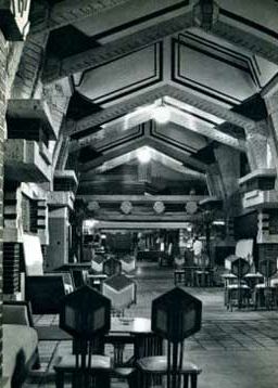 original historically important hexagonal-backed or "peacock"  imperial hotel oil cloth upholstered soak wood side chair designed by frank lloyd wright