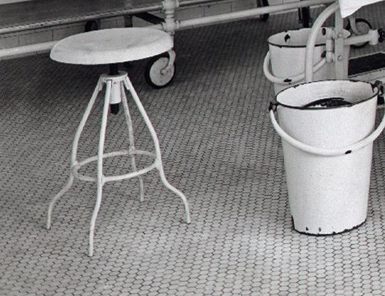 early 1920's antique american medical adjustable height hospital operating room surgeon stool with revolving circular-shaped seat