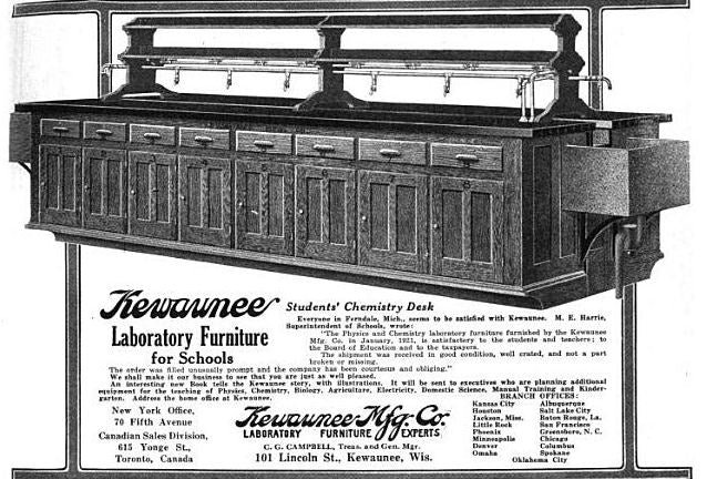 exceptionally rare c. 1916-20 american industrial thoroughly refinished chemistry laboratory compartmentalized workbench with intact swing-out stools