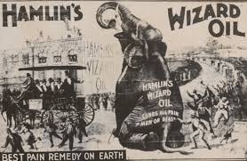 original and intact privy dug crude blue aqua early oval wizard oil patent medicine bottle manufactured for john a. and lysander b. hamlin in chicago il.