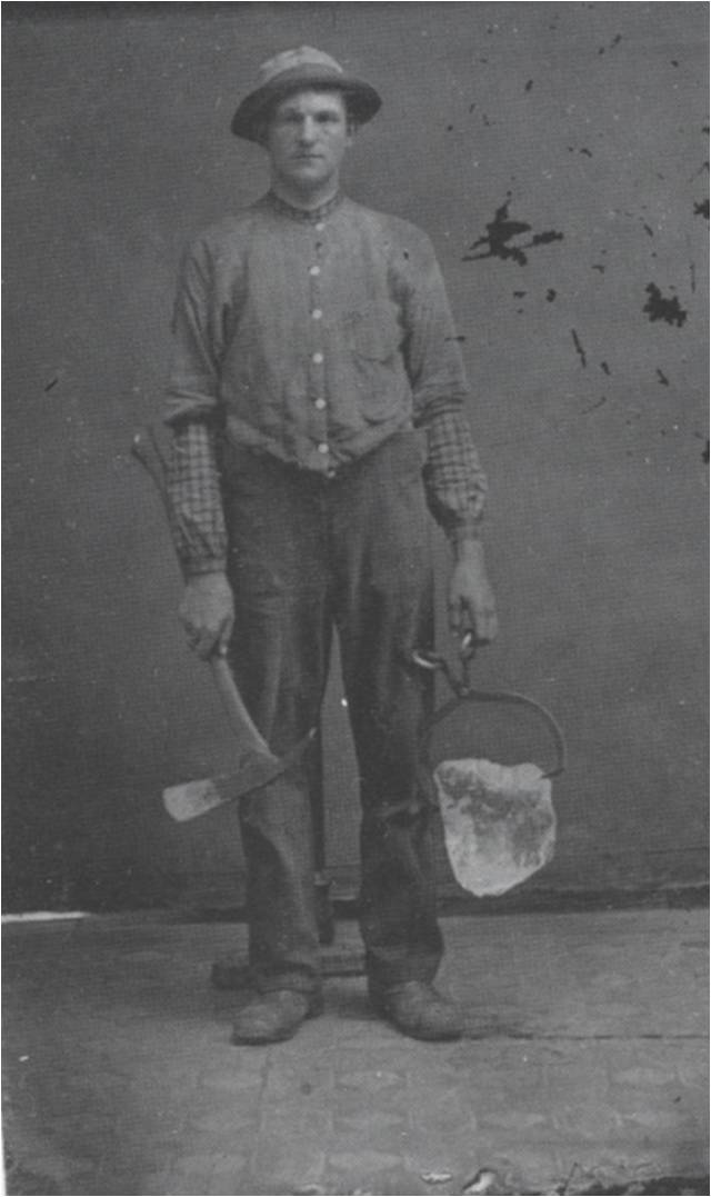 single pair of early 20th century antique american industrial fully functional brushed steel or forged iron ice block tongs with riveted joint center hinge