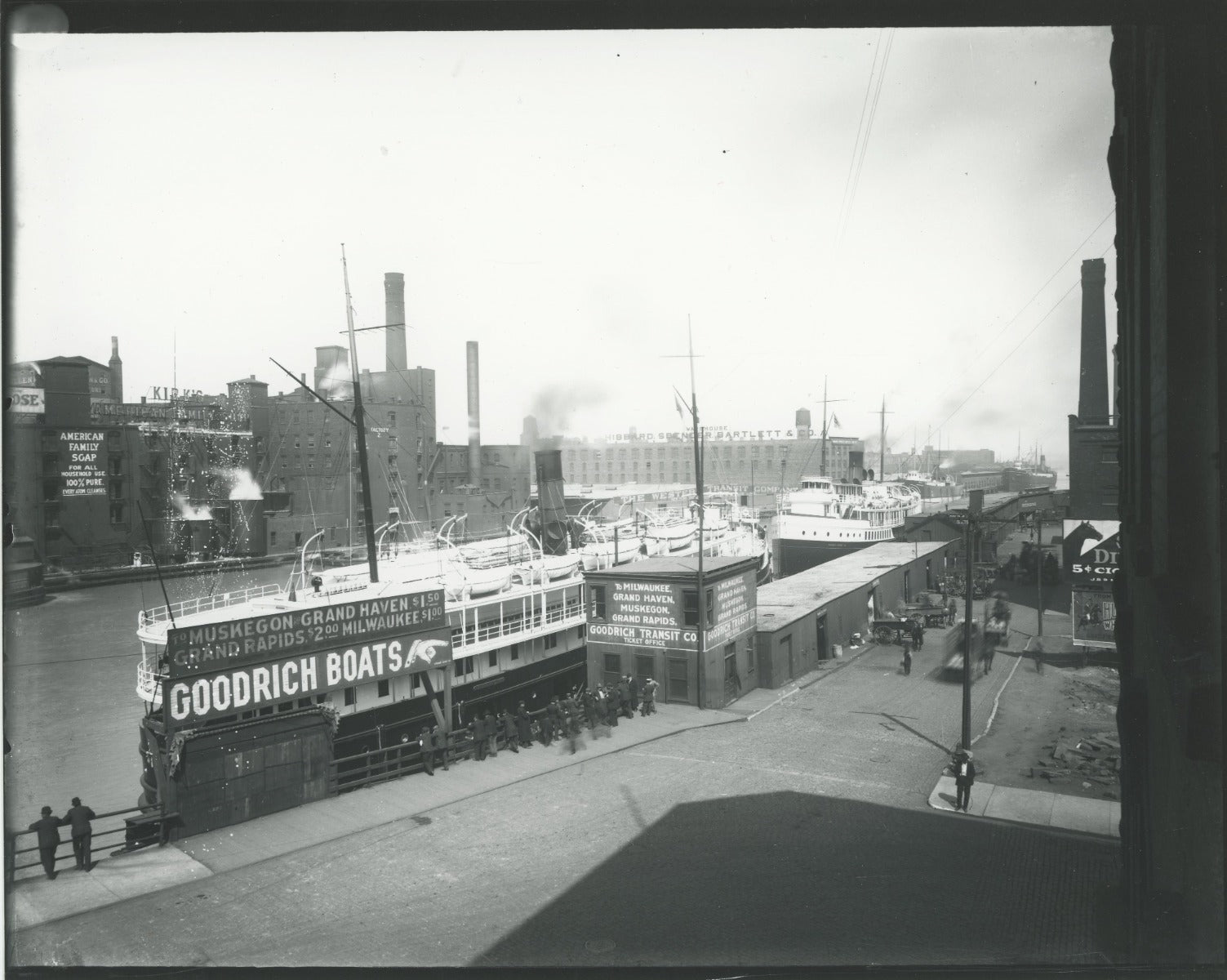 group of early 20th century kaufamnn and fabry silver gelatin prints of chicago buildings, boats, and bridges