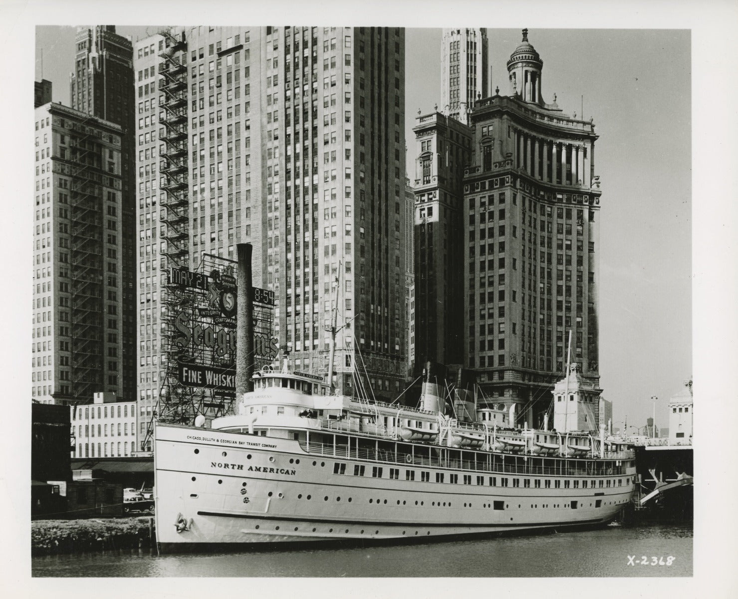 group of early 20th century kaufamnn and fabry silver gelatin prints of chicago buildings, boats, and bridges
