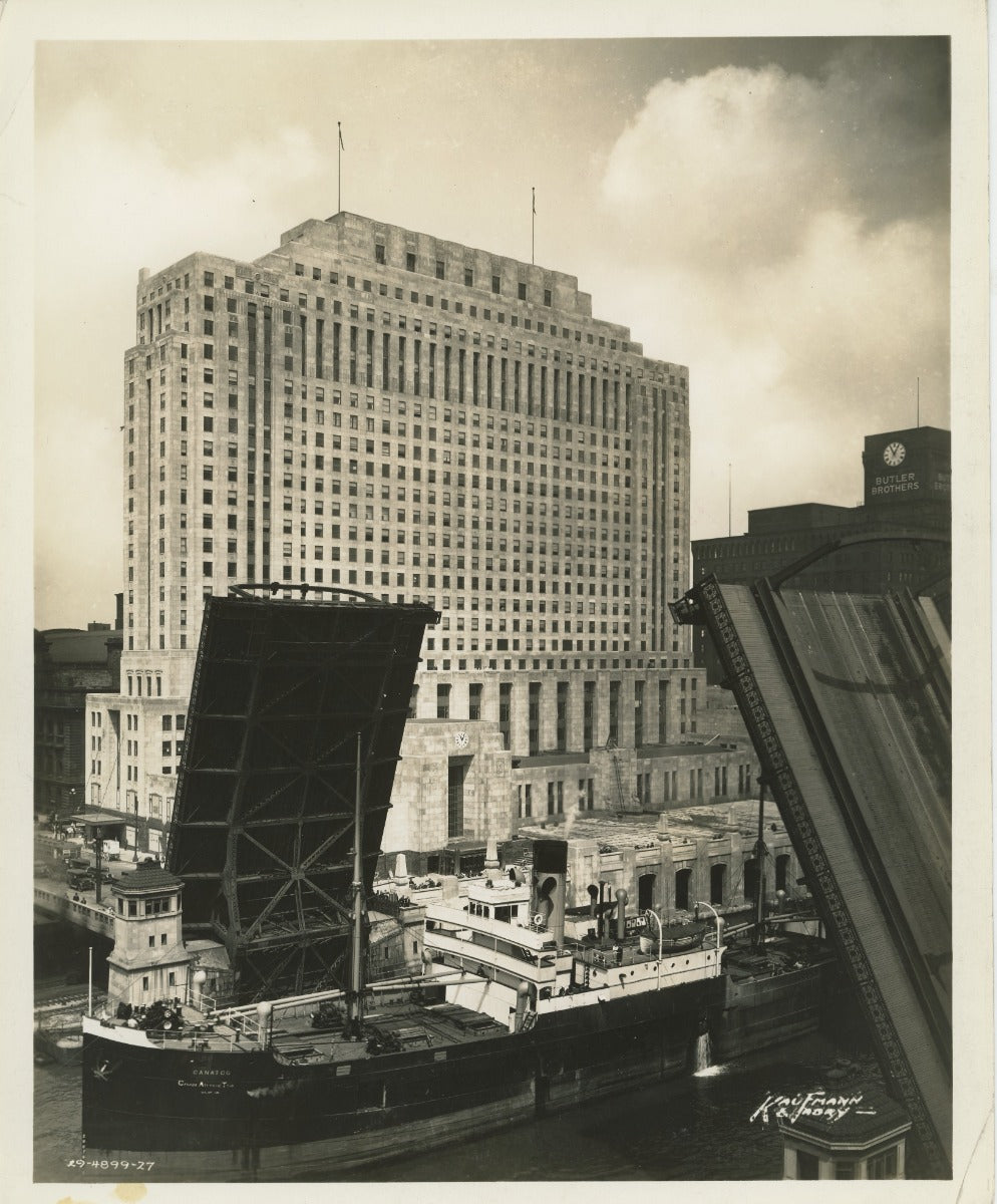 group of early 20th century kaufamnn and fabry silver gelatin prints of chicago buildings, boats, and bridges