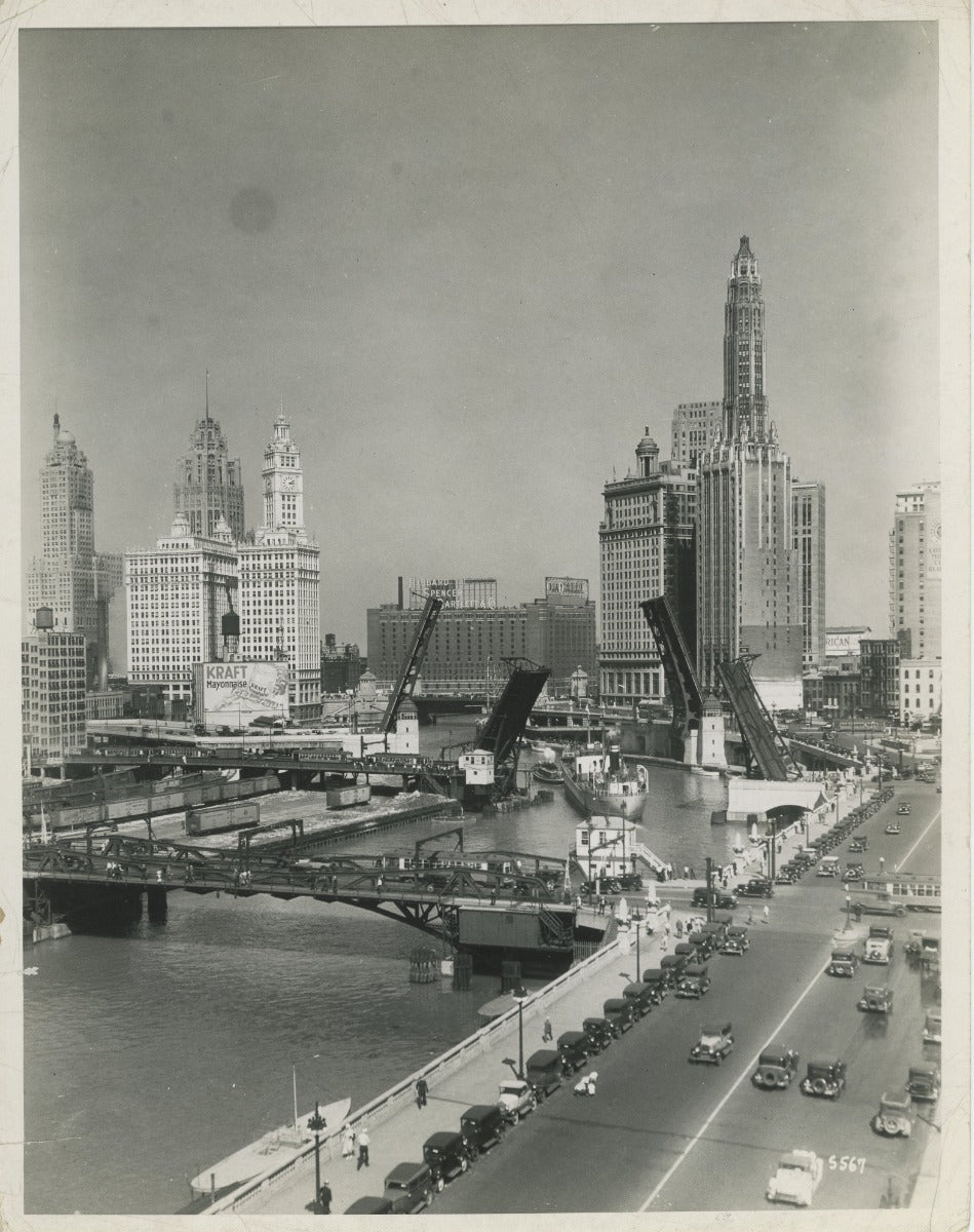 group of early 20th century kaufamnn and fabry silver gelatin prints of chicago buildings, boats, and bridges