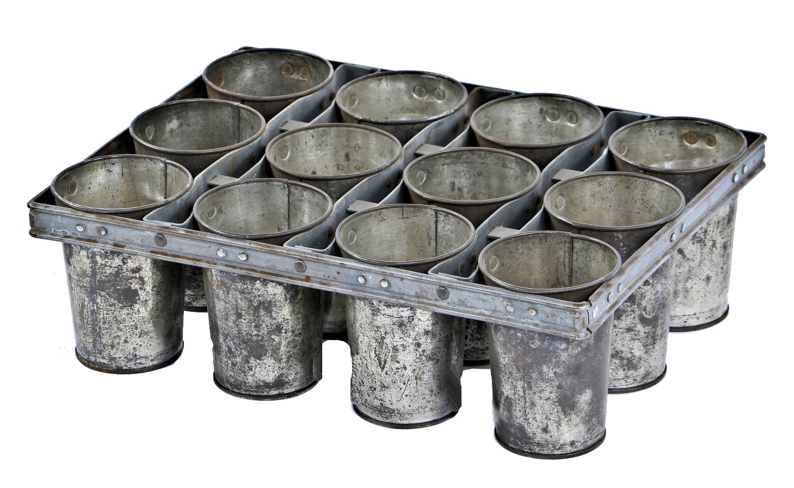 unusual early 20th century antique american industrial galvanized tin riveted joint compartmentalized cup-shaped sugar mold possibly used in a commercial bakery