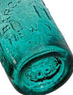 mid-nineteenth century vibrant blue-green privy dug antique american iron-pontiled soda bottle with tapered blobtop manufactured for new york bottler john tweddle jr.