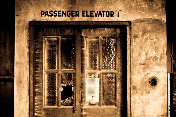 original c. 1920's american antique industrial unornamented utilitarian cast bronze "up" and "down" factory elevator cab call push button backplate