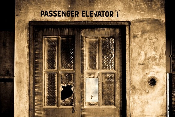 one of four matching original american antique depression era utilitarian refinished cast iron factory tower elevator "up" and down" push button call boxes