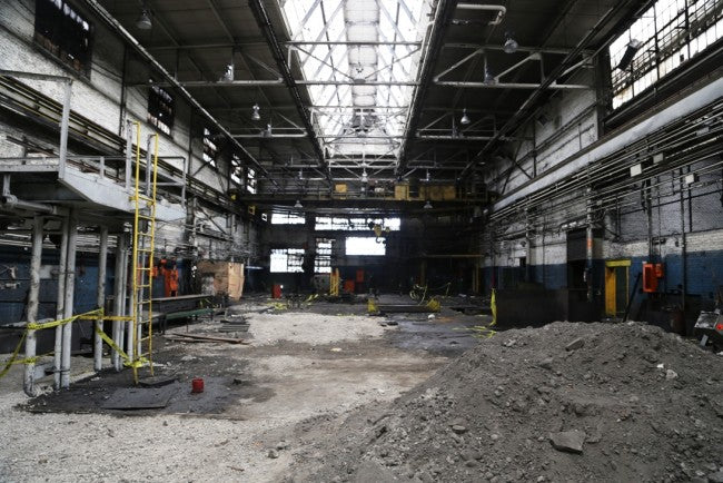 late 1940's robust all-welded joint custom built distressed blue painted solid steel four-legged american industrial foundry table with circular-shaped top