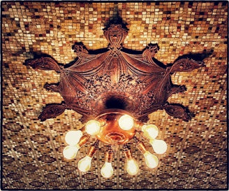 incredibly rare late 19th century oversized ornamental copper-plated cast iron guaranty building interior lobby ceiling medallion with richly ornate foliage