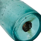 very crudely made late 1840's or 1850's original privy-dug aqua blue soda bottle with applied tapered collar manufactured for j cairns, in st. louis, mo.