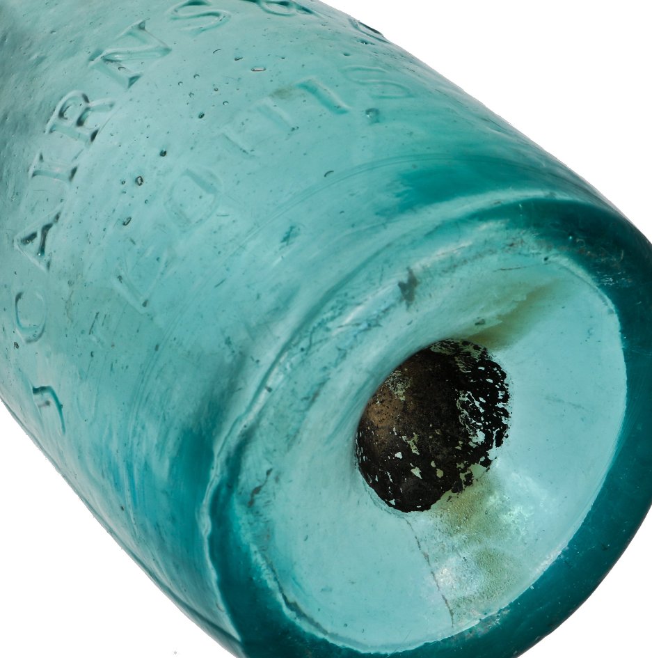 very crudely made late 1840's or 1850's original privy-dug aqua blue soda bottle with applied tapered collar manufactured for j cairns, in st. louis, mo.