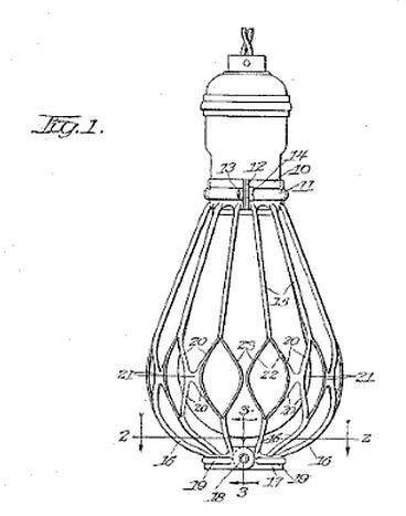 completely intact early 20th century american industrial "flexco" steel light bulb guard with integrated reflector and original finish
