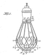 early 20th century lightly cleaned american industrial single incandescent lamp "flexco-lok" expanded metal cage or guard