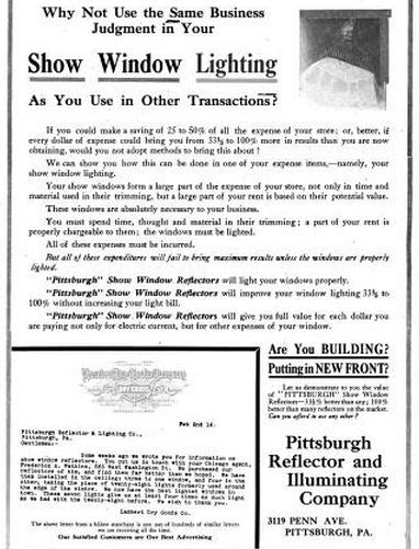 two matching c. 1915 vintage industrial green enameled "pittsburgh" store window display reflectors