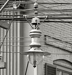 original c. 1915 american industrial white porcelain enameled "block arc" city street gas lamp with intact burner cluster
