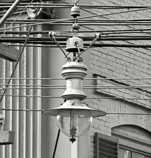 original c. 1915 american industrial white porcelain enameled "block arc" city street gas lamp with intact burner cluster