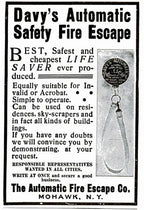 largely intact early 20th century american commercial building wall-mount "davy" fire escape device with original lithographed steel canister