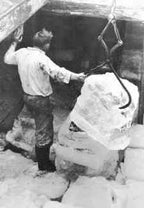 single pair of early 20th century antique american industrial fully functional brushed steel or forged iron ice block tongs with riveted joint center hinge