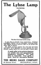american industrial fully adjustable polished brass "lyhne" portable desk or table lamp with bulbous socket housing and rotating reflector