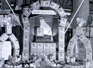 unusually small early 20th century five-light mazda edison tin-lithographed light bulb hardware store counter display with individual sockets and on/off switches