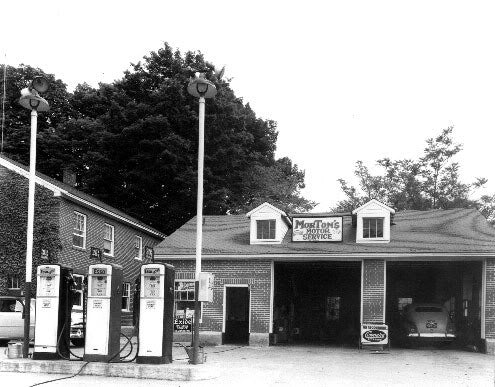 unusual late 1930's american industrial green porcelain enameled service station island light with adjustable floodlight