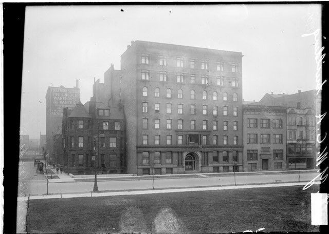 john m. van osdel ii-designed original red slip terra cotta ywca building facade exterior keystone