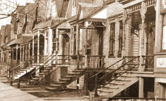 largely intact c. 1880's original antique american ornamental cast iron exterior staircase newel post accentuated with embossed rondels and a ball finial