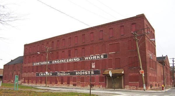 very rare and highly sought after single-sided oversized dark cobalt blue cold-rolled steel "northern crane" electric gantry crane hoist sign plaque