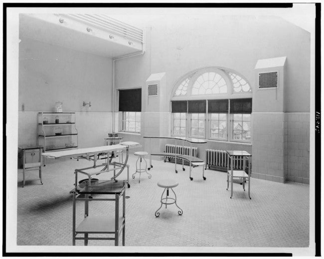 original and largely intact early 20th century antique american chicago cook county hospital stationary sterilizer cabinet or side table with single hinged cabinet door