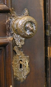 sought after original late 1860's ornamental cast bronze figural ludwig kreuzinger-designed  "doggie" doorknob with nicely aged patina