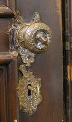 sought after original late 1860's ornamental cast bronze figural ludwig kreuzinger-designed  "doggie" doorknob with nicely aged patina