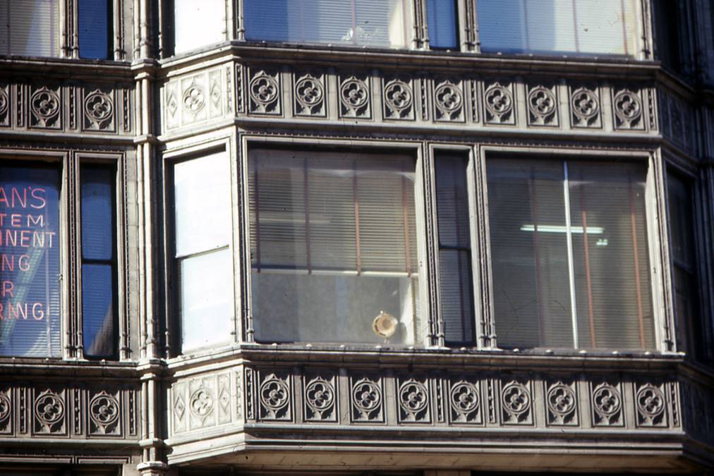 faithfully reproduced exterior burnham & atwood reliance building facade cream-colored glazed terra cotta gothic style frieze panel with centrally located floral rosette