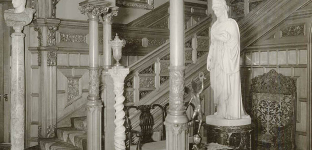 well documented 19th century museum-quality original varnished quartered oak wood and ornamental wrought iron potter palmer mansion angled staircase railing