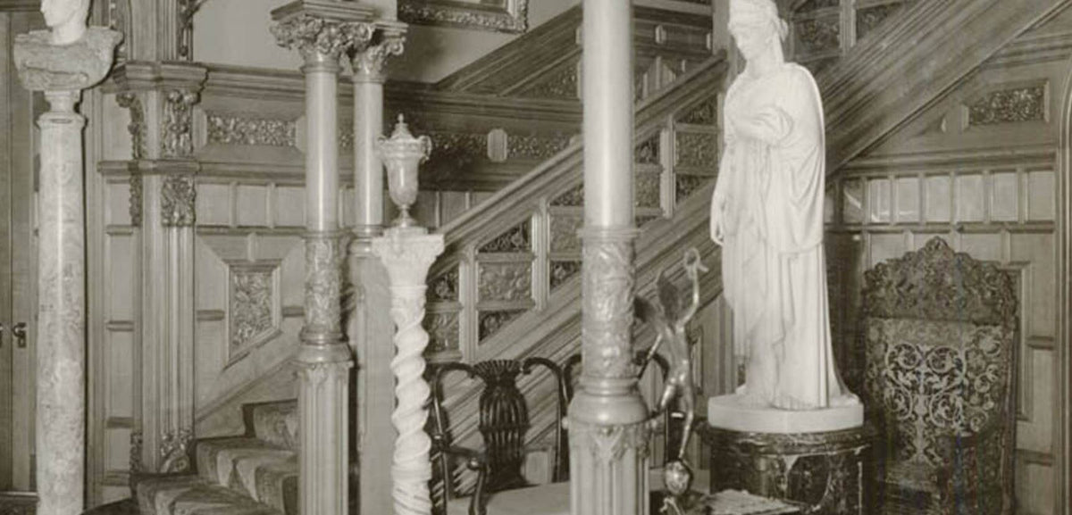 well documented 19th century museum-quality original varnished quartered oak wood and ornamental wrought iron potter palmer mansion angled staircase railing