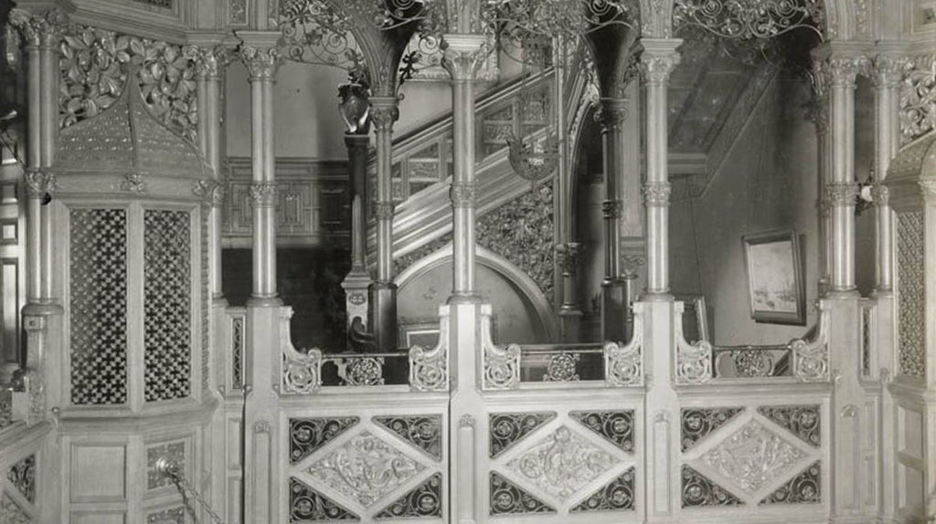 well documented 19th century museum-quality original varnished quartered oak wood and ornamental wrought iron potter palmer mansion angled staircase railing