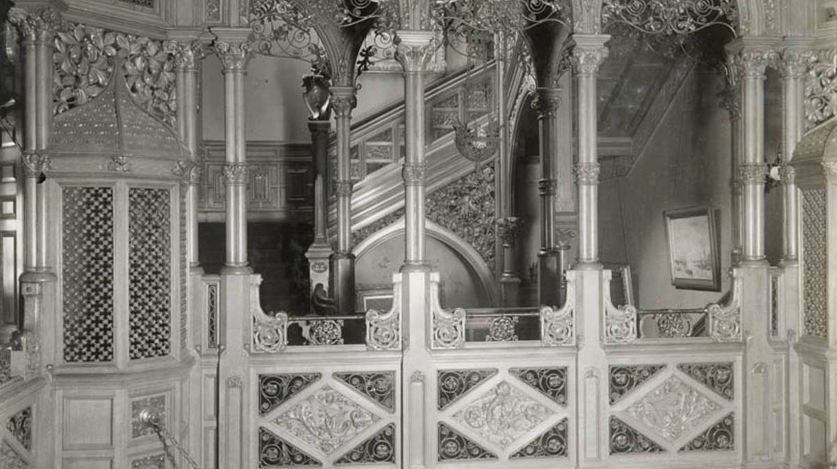 well documented 19th century museum-quality original varnished quartered oak wood and ornamental wrought iron potter palmer mansion angled staircase railing