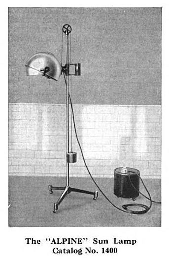 refinished early 1920's american antique medical "fischer" twin carbon electric light therapy floor lamp with unusual ornamental cast iron three-legged stand